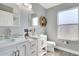 Modern bathroom with double vanity, glass sinks, and white subway tile at 136 Madiera Beach Blvd, Kissimmee, FL 34746