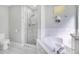 Spa-like bathroom with a large soaking tub and walk-in shower at 136 Madiera Beach Blvd, Kissimmee, FL 34746