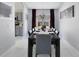 Elegant dining room with a large table and dark wood chairs at 136 Madiera Beach Blvd, Kissimmee, FL 34746