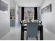Formal dining room with a large table and access to the kitchen at 136 Madiera Beach Blvd, Kissimmee, FL 34746