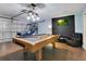 Game room featuring a pool table and arcade game at 136 Madiera Beach Blvd, Kissimmee, FL 34746