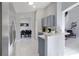 Modern kitchen with stainless steel appliances and a breakfast bar at 136 Madiera Beach Blvd, Kissimmee, FL 34746