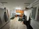 Garage workshop with cabinets and storage shelving at 14476 Se 34Th Ct, Summerfield, FL 34491