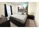 Spacious bedroom with a large bed and Disney themed decor at 1584 Sandbagger Dr, Davenport, FL 33896
