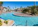 Large resort-style pool with a winding lazy river at 1584 Sandbagger Dr, Davenport, FL 33896