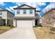 Charming two-story home featuring a two-car garage and a well-maintained front yard at 1778 Sundance Chase Rd, Minneola, FL 34715