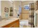 Clean bathroom with granite countertop and tiled shower/tub at 1829 Brackenhurst Pl, Lake Mary, FL 32746