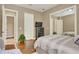 Well-lit bedroom with hardwood floors and ample closet space at 1829 Brackenhurst Pl, Lake Mary, FL 32746