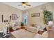 Bright exercise room with hardwood floors and plenty of natural light at 1829 Brackenhurst Pl, Lake Mary, FL 32746