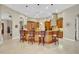 Large kitchen with island, breakfast bar, and wood cabinets at 1829 Brackenhurst Pl, Lake Mary, FL 32746