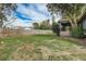 Side view of fenced yard with large grassy area at 1886 Elkcam Blvd, Deltona, FL 32725