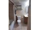 Standard bathroom featuring tile flooring, a toilet, vanity, and a shower/tub combo at 1928 Conway Rd # 27, Orlando, FL 32812