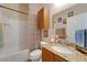 Clean bathroom with granite vanity and shower/tub combo at 2147 Sunbow Ave, Apopka, FL 32703
