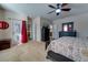 Spacious bedroom with large bed, dresser, and access to private balcony at 2147 Sunbow Ave, Apopka, FL 32703