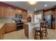 Modern kitchen features granite counters and stainless steel appliances at 2147 Sunbow Ave, Apopka, FL 32703