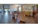 Living room with hardwood floors, a couch, and two armchairs at 2147 Sunbow Ave, Apopka, FL 32703