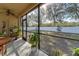 Screened porch overlooking backyard with fenced yard at 2147 Sunbow Ave, Apopka, FL 32703