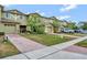 Townhome community with multiple units and parking at 2311 Chatham Place Dr, Orlando, FL 32824