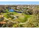 Golf course community with pond and lush landscaping at 236 Acadia Ter, Celebration, FL 34747