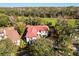 Luxury home with red tile roof, situated on a golf course community at 236 Acadia Ter, Celebration, FL 34747