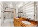 Bathroom boasts double sinks, a tub, and marble accents at 236 Acadia Ter, Celebration, FL 34747