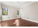 Bright bedroom with hardwood floors and large windows, offering natural light at 236 Acadia Ter, Celebration, FL 34747