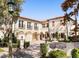 Stunning two-story home with tile roof, arched entryway, and gated courtyard at 236 Acadia Ter, Celebration, FL 34747