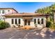 Charming home exterior with a red tile roof and mature landscaping at 236 Acadia Ter, Celebration, FL 34747