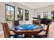 Game room featuring a poker table, grand piano, and plenty of natural light at 236 Acadia Ter, Celebration, FL 34747