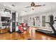 Home gym featuring a variety of equipment, including a treadmill and weight machine at 236 Acadia Ter, Celebration, FL 34747