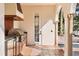 Outdoor kitchen with stainless steel grill and beverage cooler at 236 Acadia Ter, Celebration, FL 34747