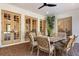 Relaxing outdoor patio features a dining table and comfortable seating at 236 Acadia Ter, Celebration, FL 34747
