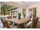 Inviting outdoor patio features a dining table and comfortable seating at 236 Acadia Ter, Celebration, FL 34747