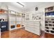 Spacious walk-in closet with custom shelving, drawers, and ample storage for shoes, accessories, and clothing at 236 Acadia Ter, Celebration, FL 34747