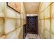 Well-stocked wine cellar with built-in racking and a wine cooler at 236 Acadia Ter, Celebration, FL 34747