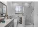 Spa-like bathroom featuring a soaking tub and a large shower at 2513 Castle Pines St, Clermont, FL 34711