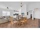Open concept dining area with kitchen and living room views at 2513 Castle Pines St, Clermont, FL 34711