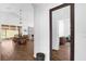 Bright entryway with a full-length mirror and view into dining area at 2513 Castle Pines St, Clermont, FL 34711