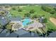 Community pool with lounge chairs and cabanas at 2513 Castle Pines St, Clermont, FL 34711