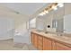 Primary bathroom with double sinks and garden tub at 2627 Oneida Loop, Kissimmee, FL 34747