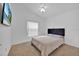 Comfortable bedroom with a queen-size bed and TV at 2627 Oneida Loop, Kissimmee, FL 34747