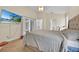 Bedroom with sliding glass doors leading to patio at 2627 Oneida Loop, Kissimmee, FL 34747