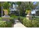 Landscaped entrance to the community with playground in the background at 2793 Lido Key Dr, Kissimmee, FL 34747