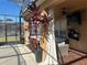Covered patio with seating and large potted plants at 2793 Lido Key Dr, Kissimmee, FL 34747