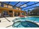 Resort-style pool and spa with covered patio and comfortable seating at 2793 Lido Key Dr, Kissimmee, FL 34747