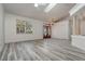 Bright and airy living room with hardwood floors and large windows at 304 Sun Oaks Ct, Lake Mary, FL 32746