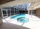 Inviting screened pool and spa area at 304 Sun Oaks Ct, Lake Mary, FL 32746