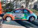 VW Bug decorated for Fantasy World Resort at 3187 Sea World Ct, Kissimmee, FL 34746