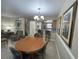 Bright dining area with table and chairs, kitchen view at 3187 Sea World Ct, Kissimmee, FL 34746