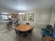 Bright dining area with table and chairs, kitchen view at 3187 Sea World Ct, Kissimmee, FL 34746